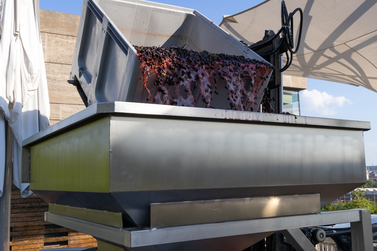 A large metal box sitting on top of a roof
